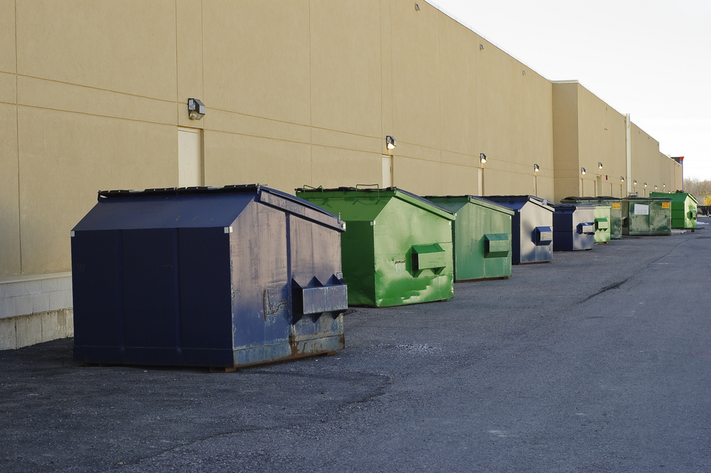 blue-green-industrial-garbage-bins-lined